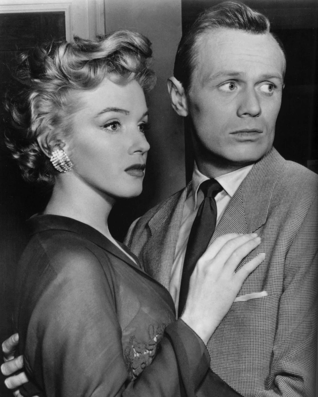 Don't Bother to Knock - Public Domain - This work is in the public domain because it was published in the United States between 1931 and 1963, and although there may or may not have been a copyright notice, the copyright was not renewed. Marilyn Monroe and Richard Widmark in a promotional image for Don't Bother to Knock (1952)
